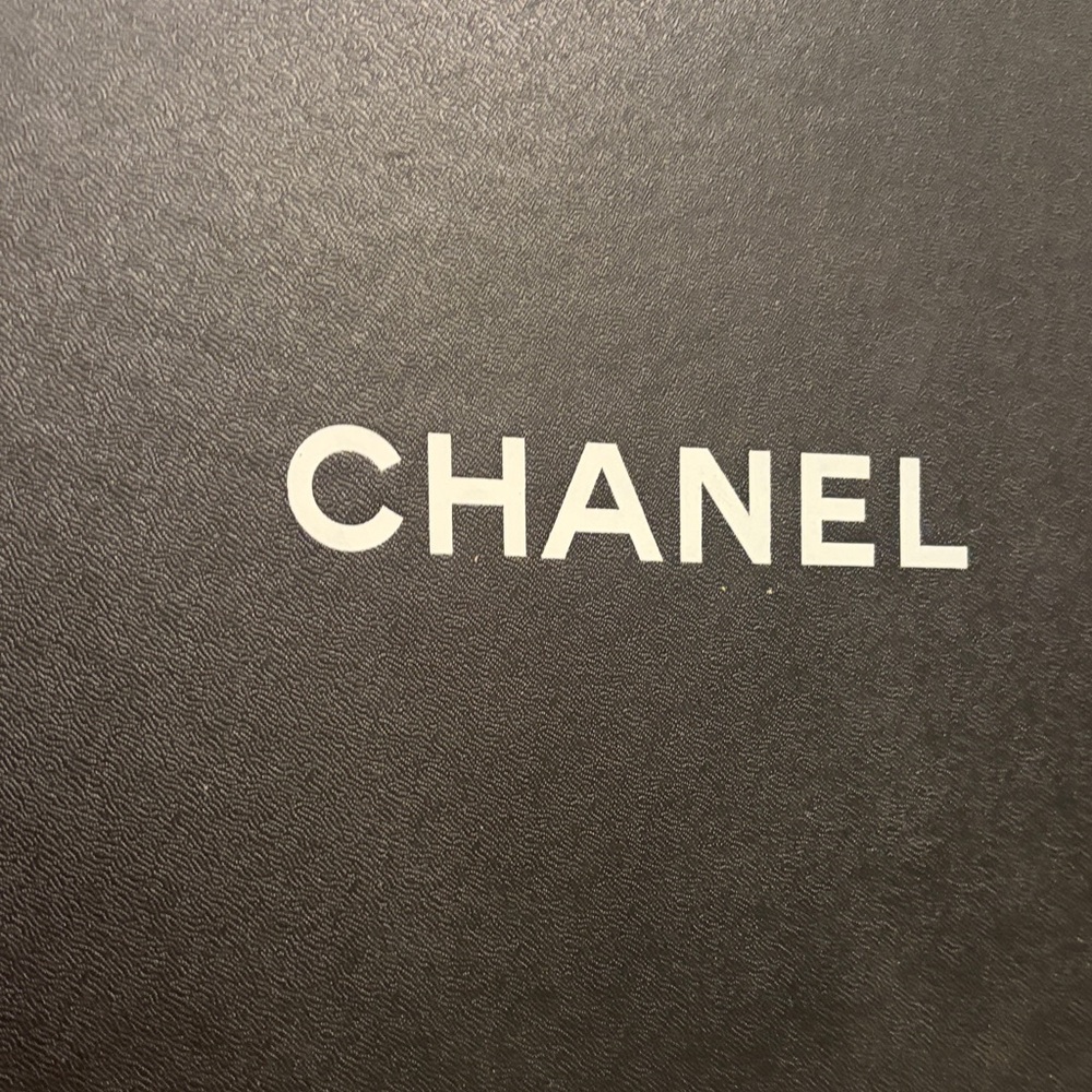 CHANEL Women's Black and White Sneakers - Picture 2 of 12